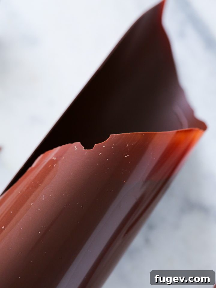 Ice Bath Tempering Your Dark Chocolate to Perfection 5 Close-up of perfectly tempered dark chocolate with a glossy finish