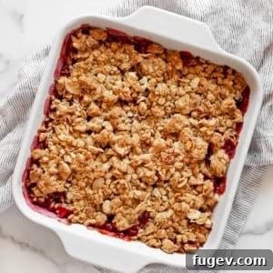 Quick Delicious Cherry Crumble 8 Cherry crumble in a square baking dish.