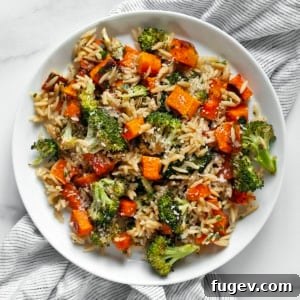 Hearty Roasted Butternut Squash and Broccoli Orzo 9 Roasted butternut squash and broccoli orzo on a plate, ready to be enjoyed.