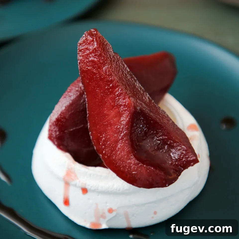 Heavenly Poached Pear Pavlova 2 Poached Pear Pavlova with red wine poached pears