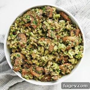 Balsamic mushroom broccoli rice in a bowl, ready to serve.