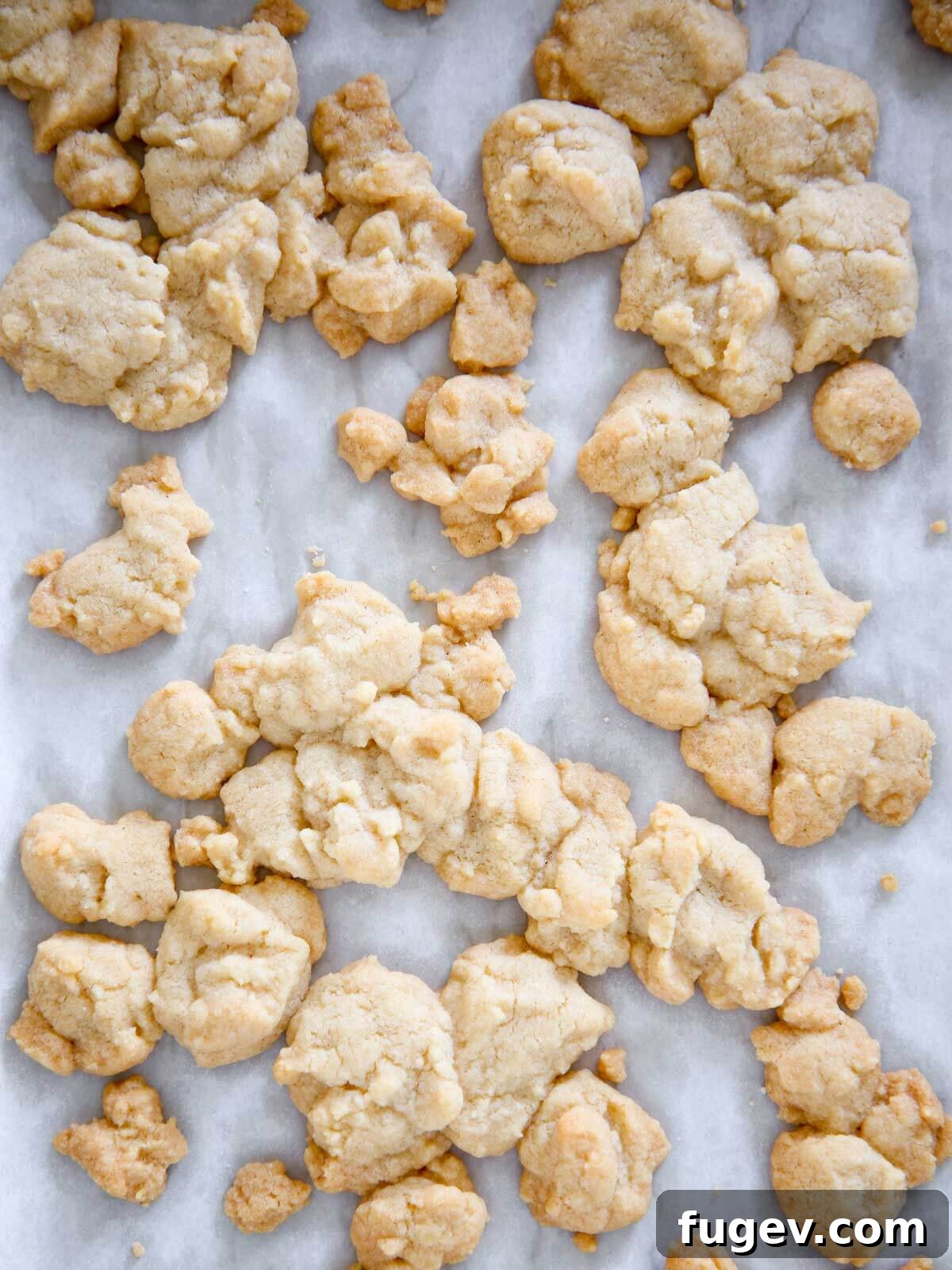 Buttery Crumb Topping 2 Golden brown streusel topping baked on a sheet pan, ready to be used as a delicious dessert sprinkle.