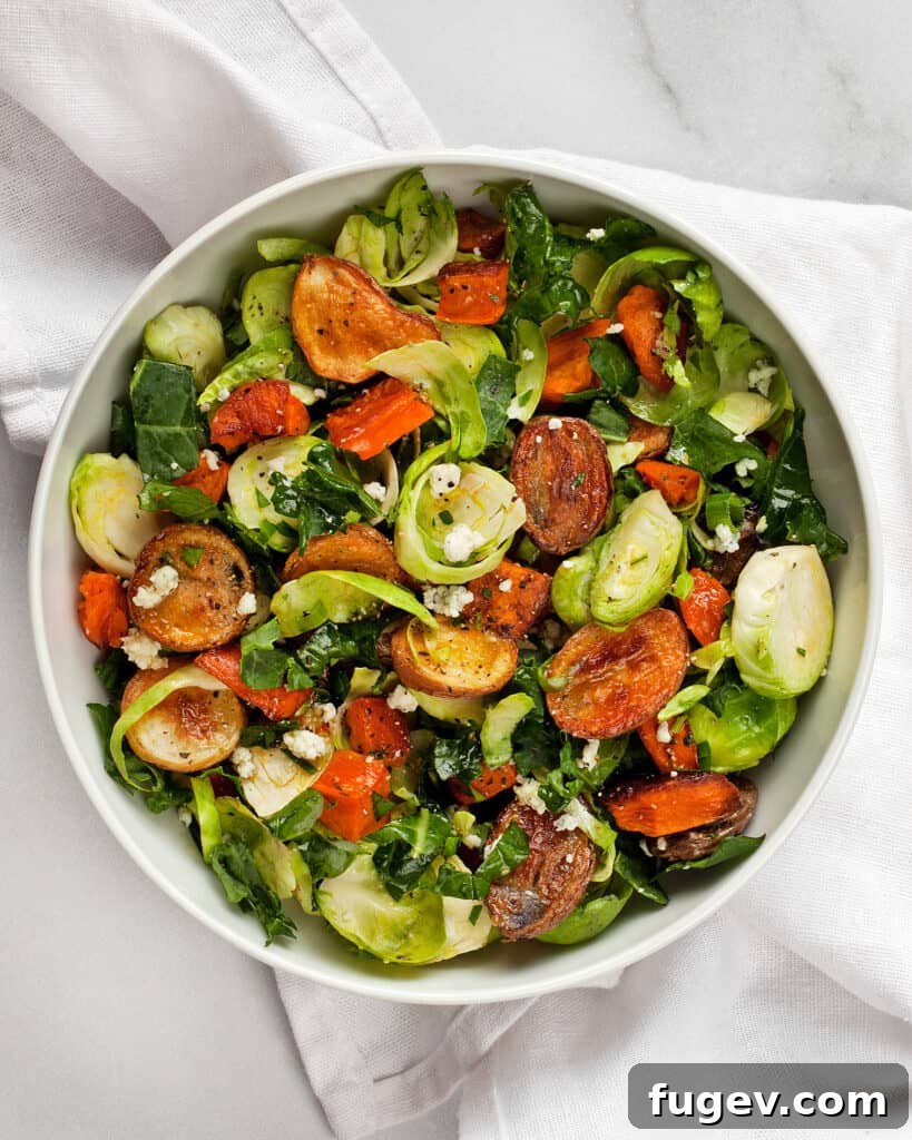 Golden Roasted Potato and Brussels Sprout Salad 6 A vibrant bowl of Roasted Potato Brussels Sprout Salad, garnished and ready