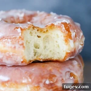 Homemade Krispy Kreme Style Donuts 5 Krispy Kreme Copycat donut interior, showing its airy structure.