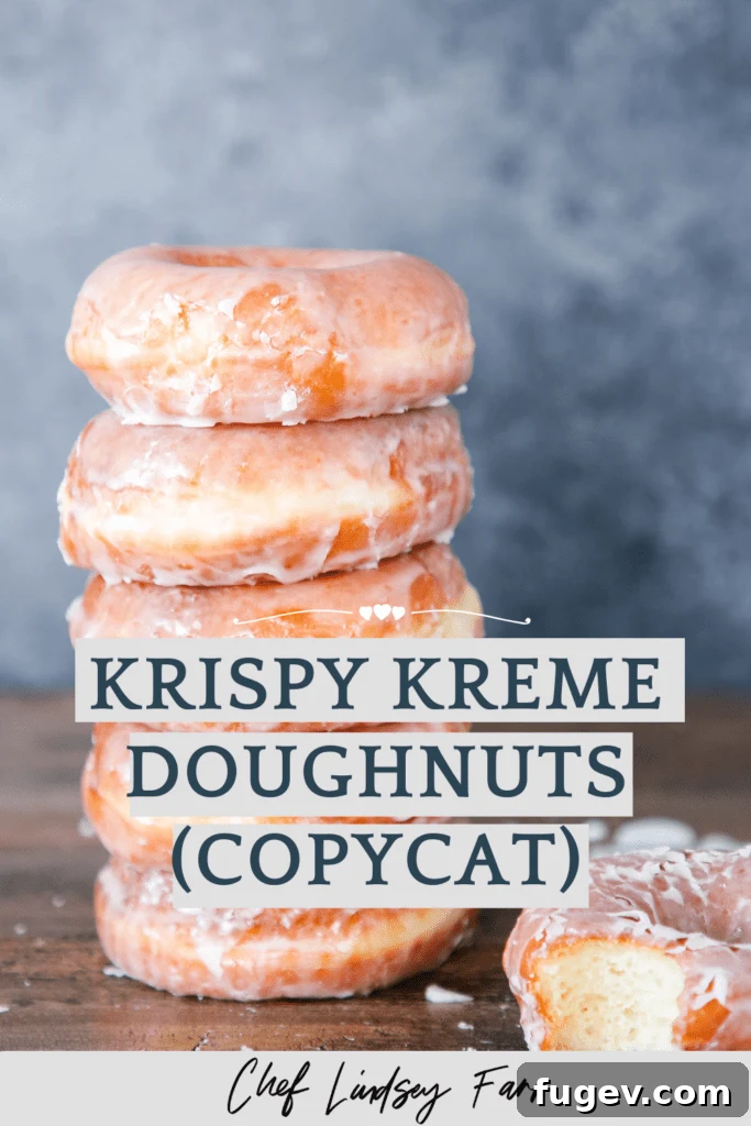 Homemade Krispy Kreme Style Donuts 6 Krispy Kreme Doughnut Recipe (Copycat) - a stack of two perfectly glazed donuts.