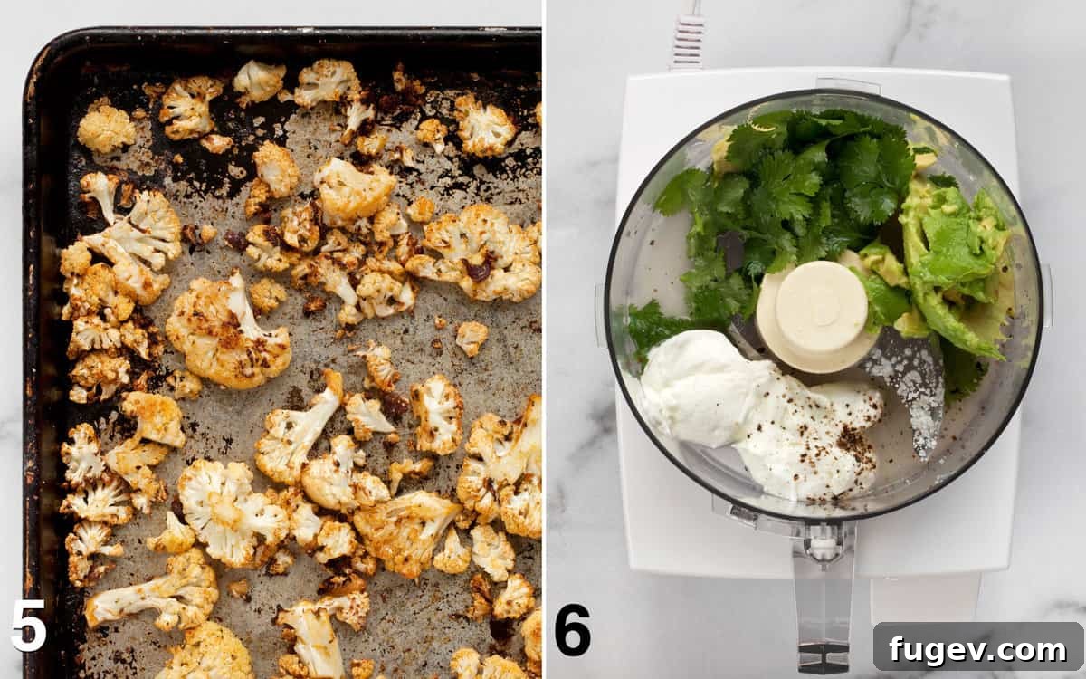 Smoky Chipotle Cauliflower Tacos 6 A sheet pan loaded with perfectly roasted, golden-brown cauliflower. Below, the ingredients for avocado crema are visible in a food processor, ready to be blended.