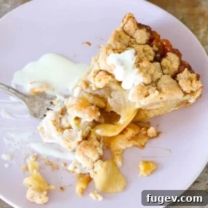 Caramel Apple Tart with cinnamon streusel, a delightful autumn dessert.
