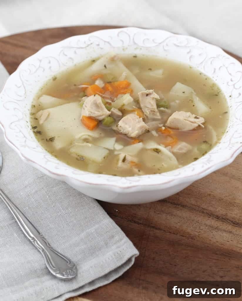 Hearty Homemade Chicken Noodle 3 Fresh ingredients for chicken noodle soup including carrots, celery, and herbs.