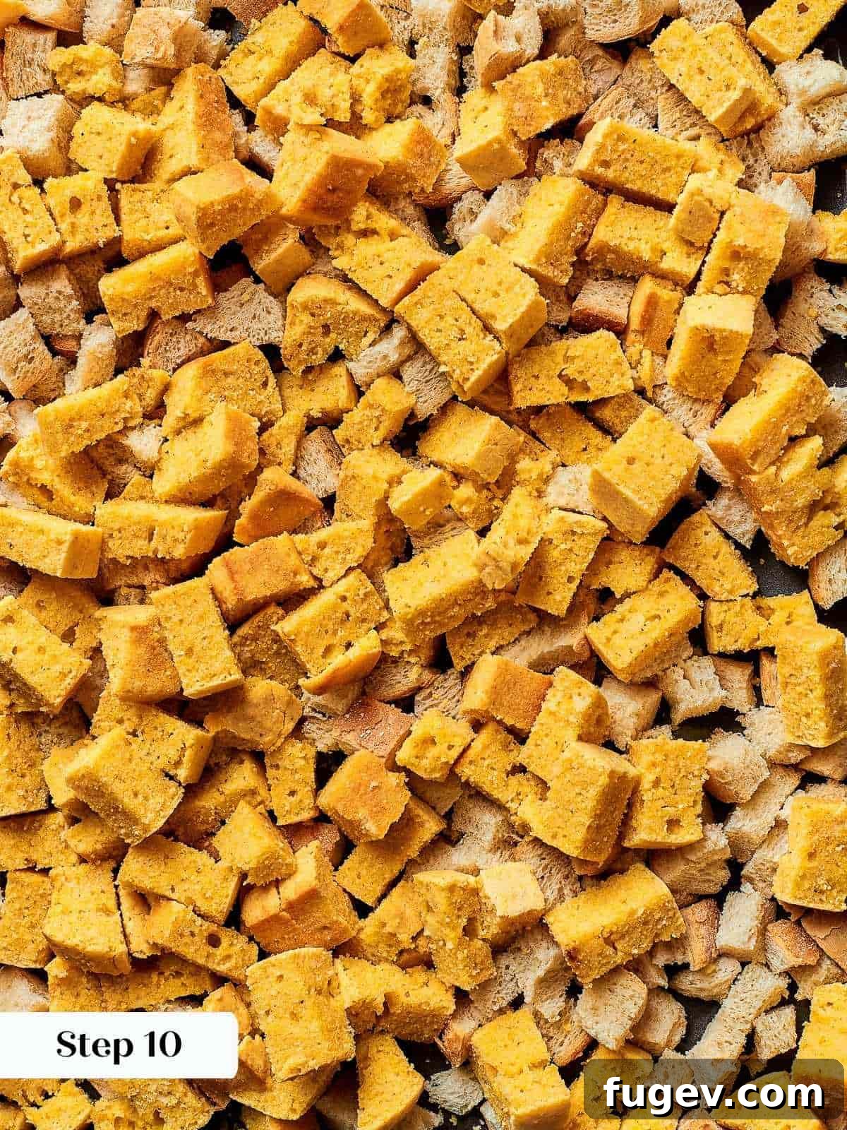 Down-Home Southern Cornbread Dressing 13 Cubes of cornbread and rustic bread spread on a baking sheet to dry overnight.