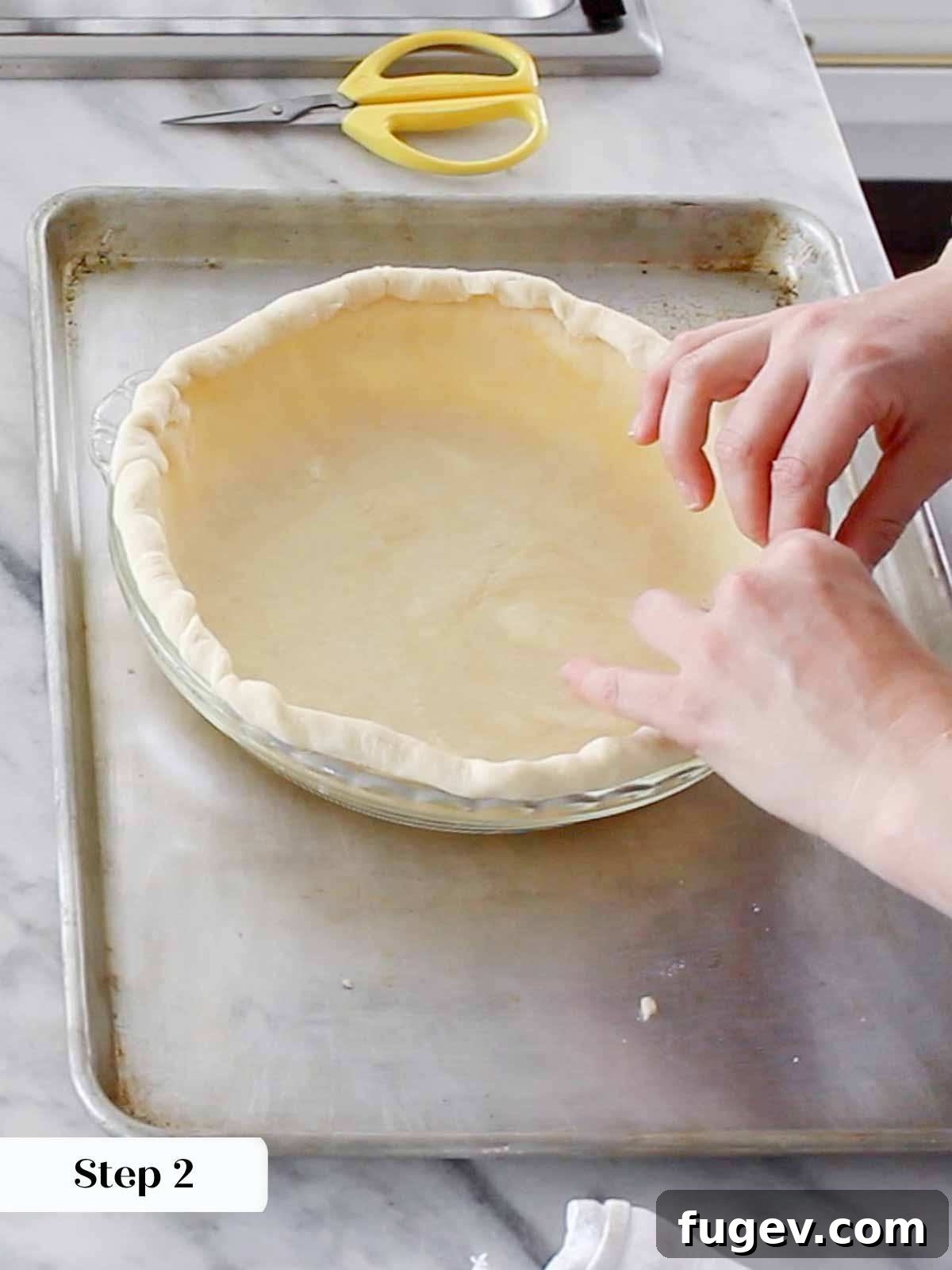 The Perfect Pecan Pie 5 Another perspective of pie dough being carefully fitted into a pie pan, showing the initial stages of shaping.