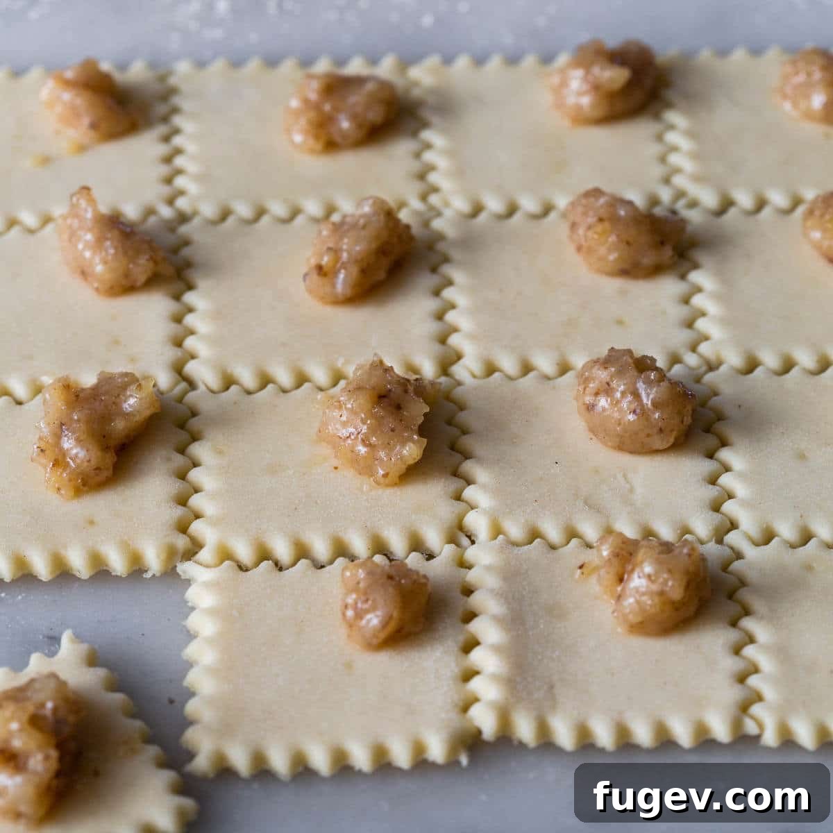 Hungarian Walnut Roll Cookies 11 walnut filling on dough squares.