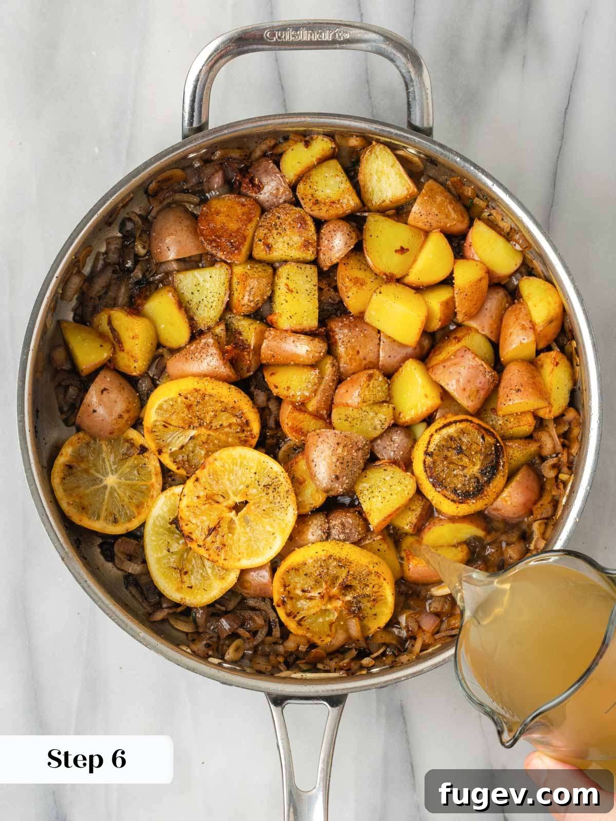 Zesty Lemon Chicken 9 Adding chicken stock to the pan to simmer with the tender potatoes and aromatic vegetables, building flavor.