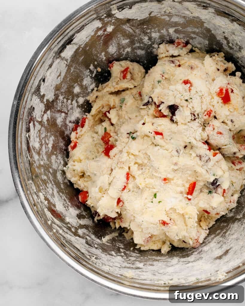 Crimson Chevre Scones 7 The shaggy biscuit dough formed by combining wet and dry ingredients.
