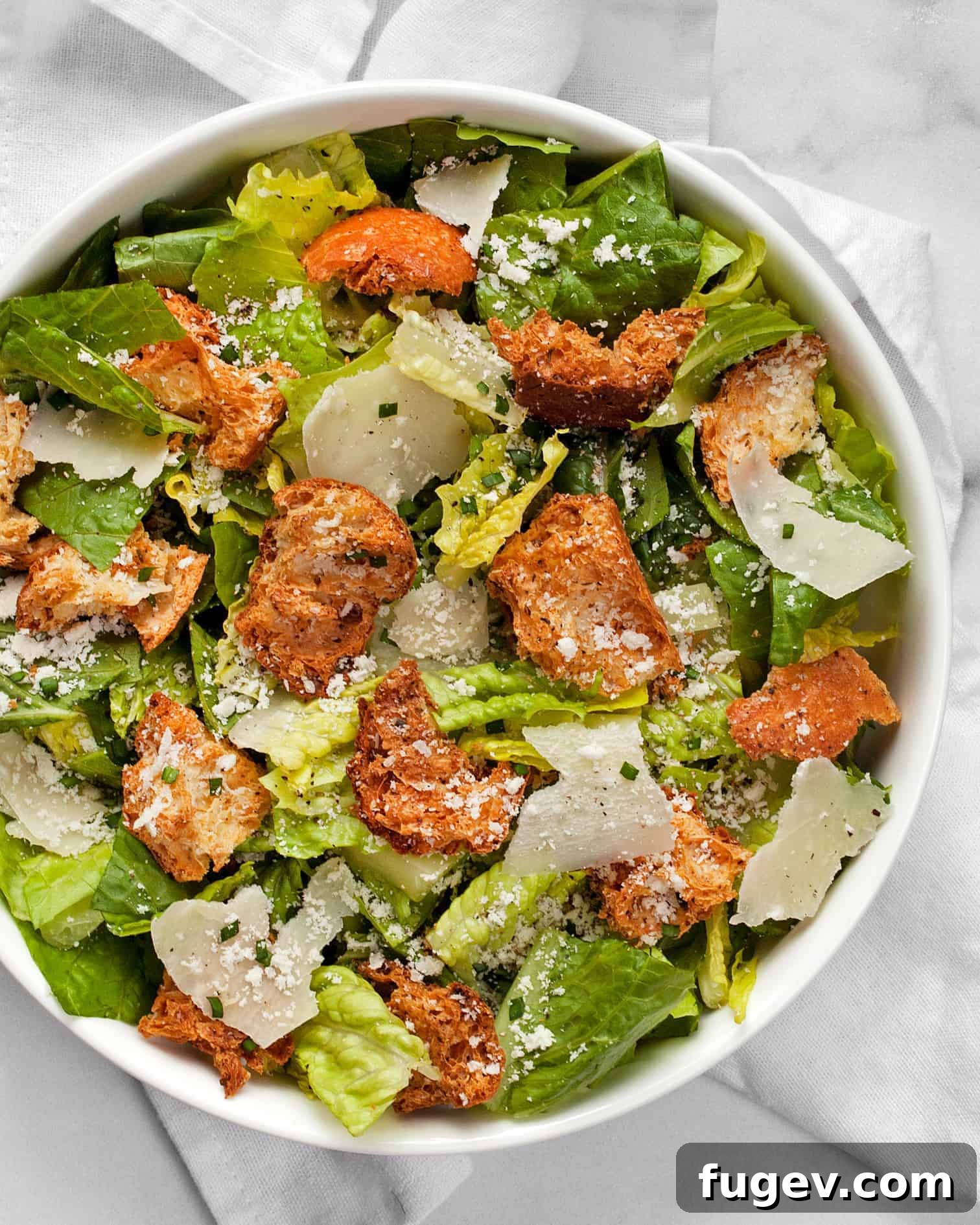 Perfect Homemade Croutons 2 Romaine salad with croutons and Parmesan cheese.
