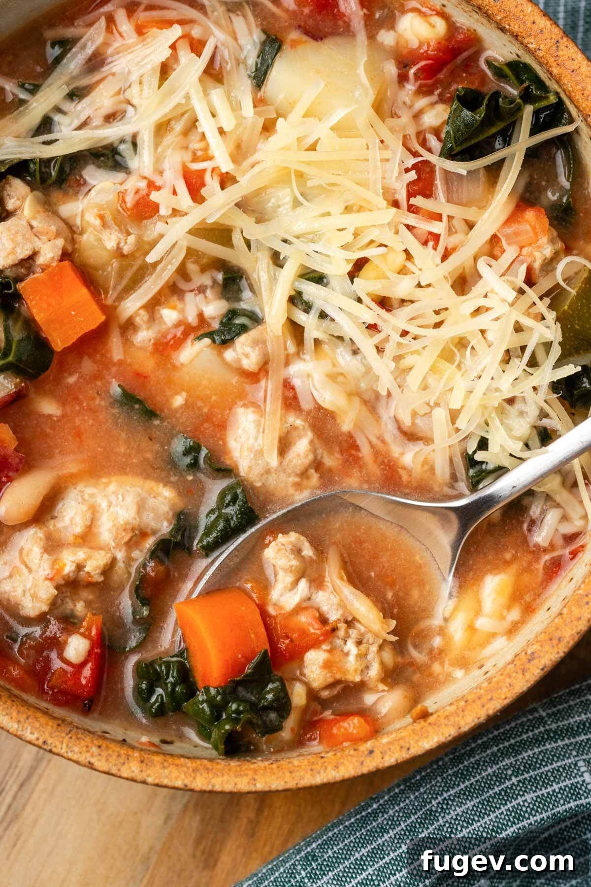 Wholesome Ground Turkey Soup 2 A steaming bowl of hearty ground turkey soup, garnished with fresh herbs, ready to be enjoyed.