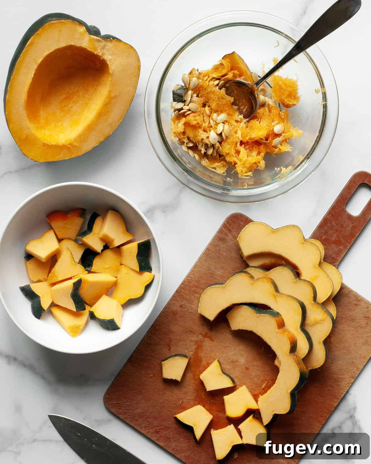 Golden Harvest Squash Salad 4 Expertly cut acorn squash pieces, ready for roasting, laid out on a cutting board, demonstrating the ideal size and shape for the salad.