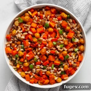 Caramelized Carrot Farro 8 Farro with roasted carrots and chickpeas in a bowl.