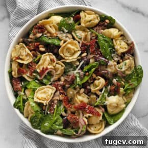 Tortellini pasta salad in a bowl.