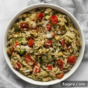 Roasted zucchini tomato orzo in a bowl