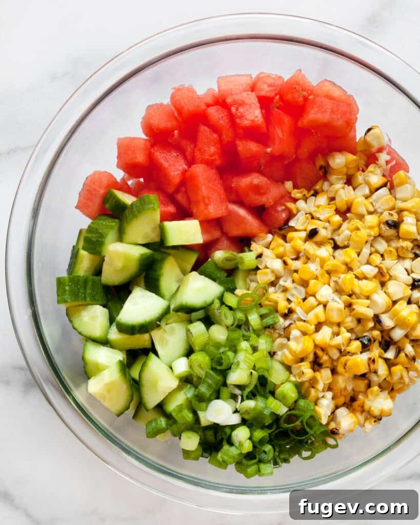 Vibrant Watermelon Cucumber Corn Medley 5 Ingredients for Watermelon Cucumber Corn Salad: watermelon, cucumbers, grilled corn & scallions