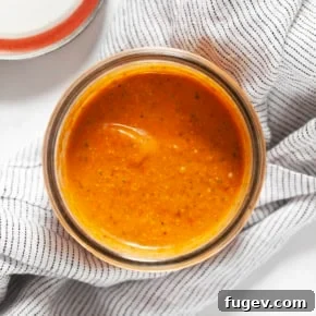 Roasted tomato vinaigrette in a jar.