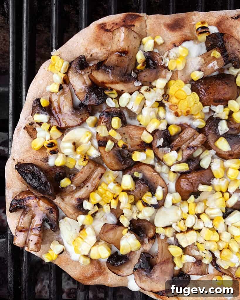 Smoky Mushroom and Sweet Corn Pizza 6 Mushroom pizza on the grill