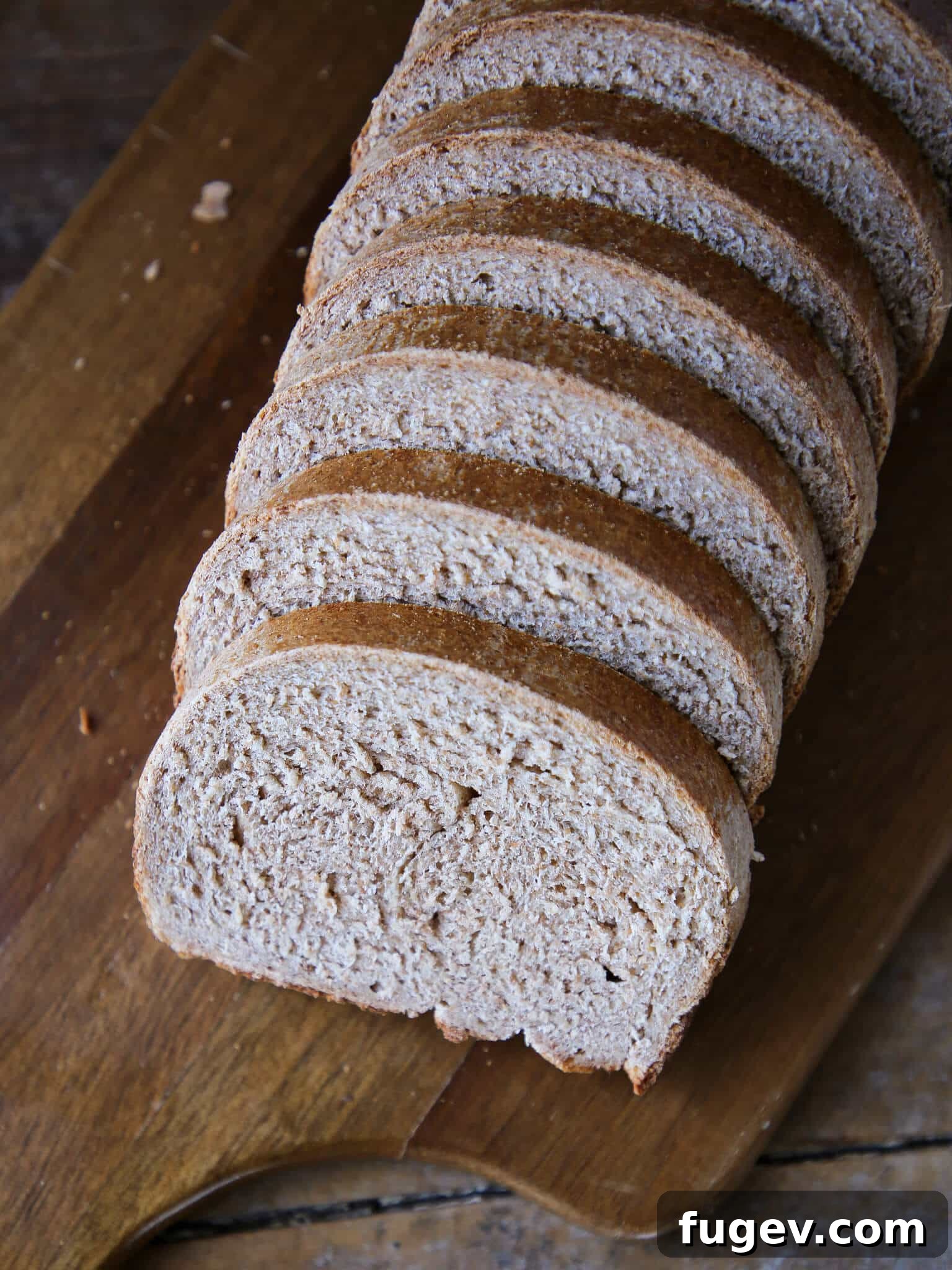 Whole Wheat Sourdough Bread 2 Whole wheat bread sliced tender inside, showcasing its soft, wholesome texture.