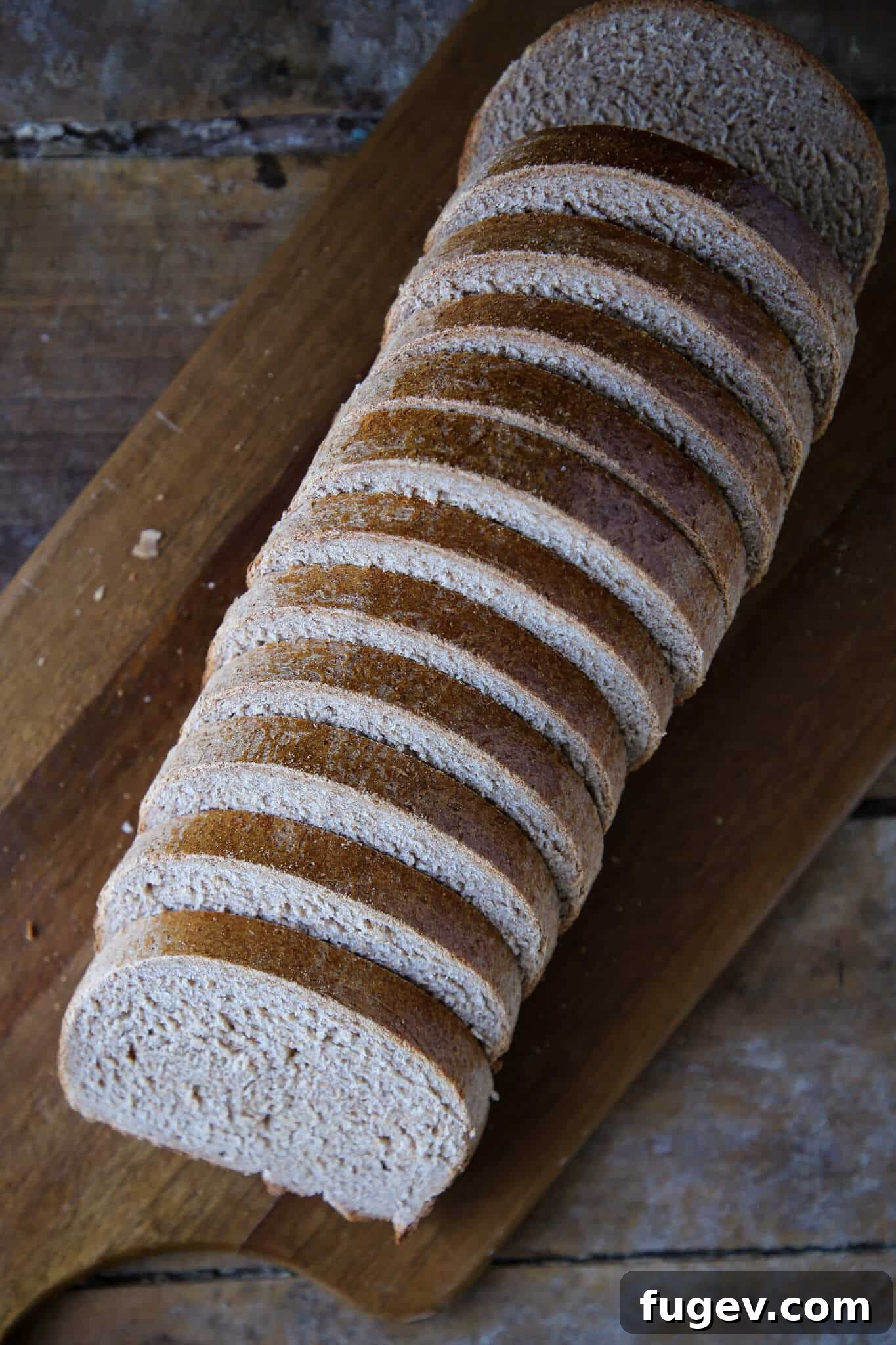 Whole Wheat Sourdough Bread 6 Whole wheat bread thinly sliced, ready for serving.
