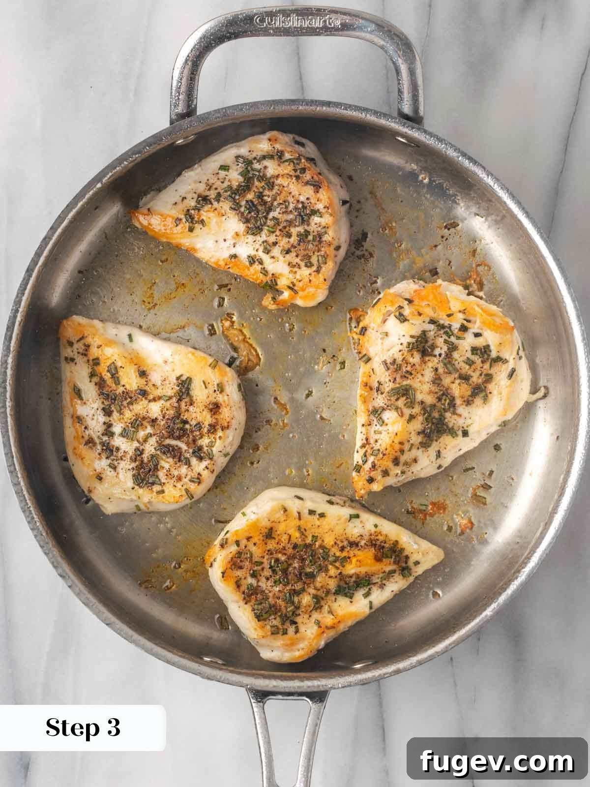 Hearty Marinara Chicken Bake 6 seared chicken breasts acquiring a golden-brown crust in the pan.