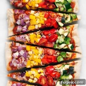 Vibrant Grilled Rainbow Veggie Pizza with assorted vegetables