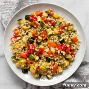 Roasted vegetable couscous on a plate.