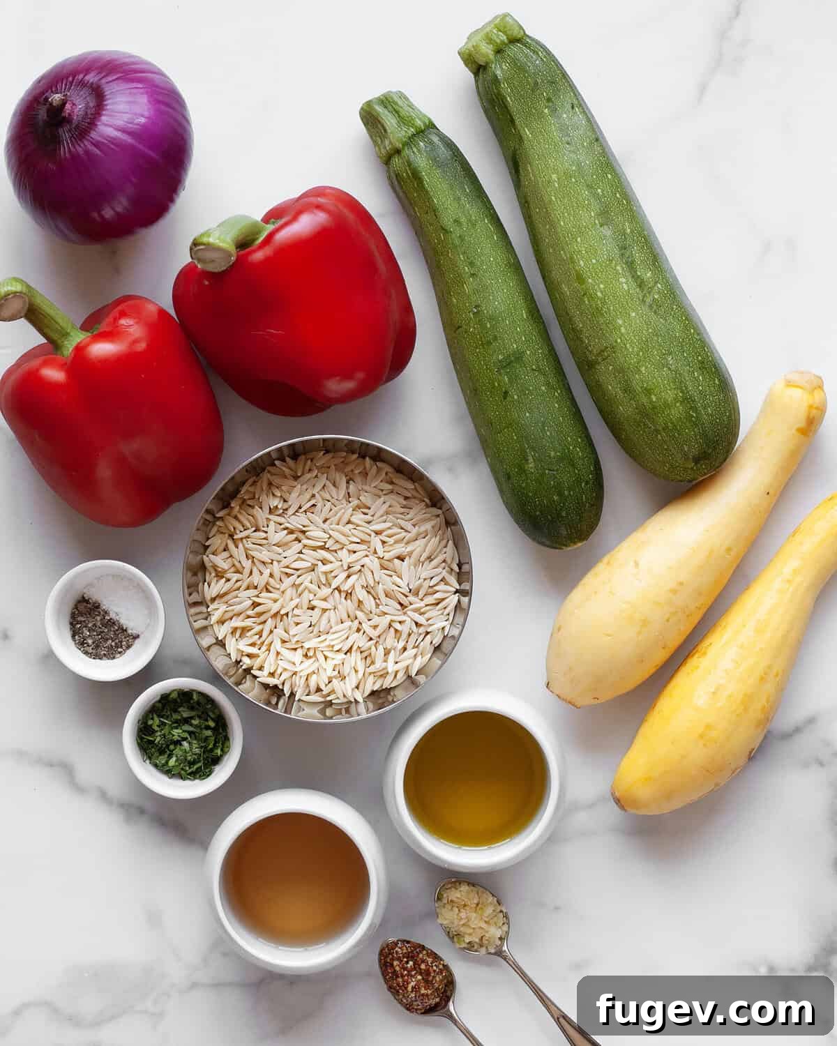 Smoky Garden Orzo Salad 3 Ingredients for grilled vegetable orzo salad: orzo pasta, zucchini, yellow squash, bell peppers, red onions, white wine vinegar, olive oil, garlic, mustard, fresh parsley, salt, and black pepper.