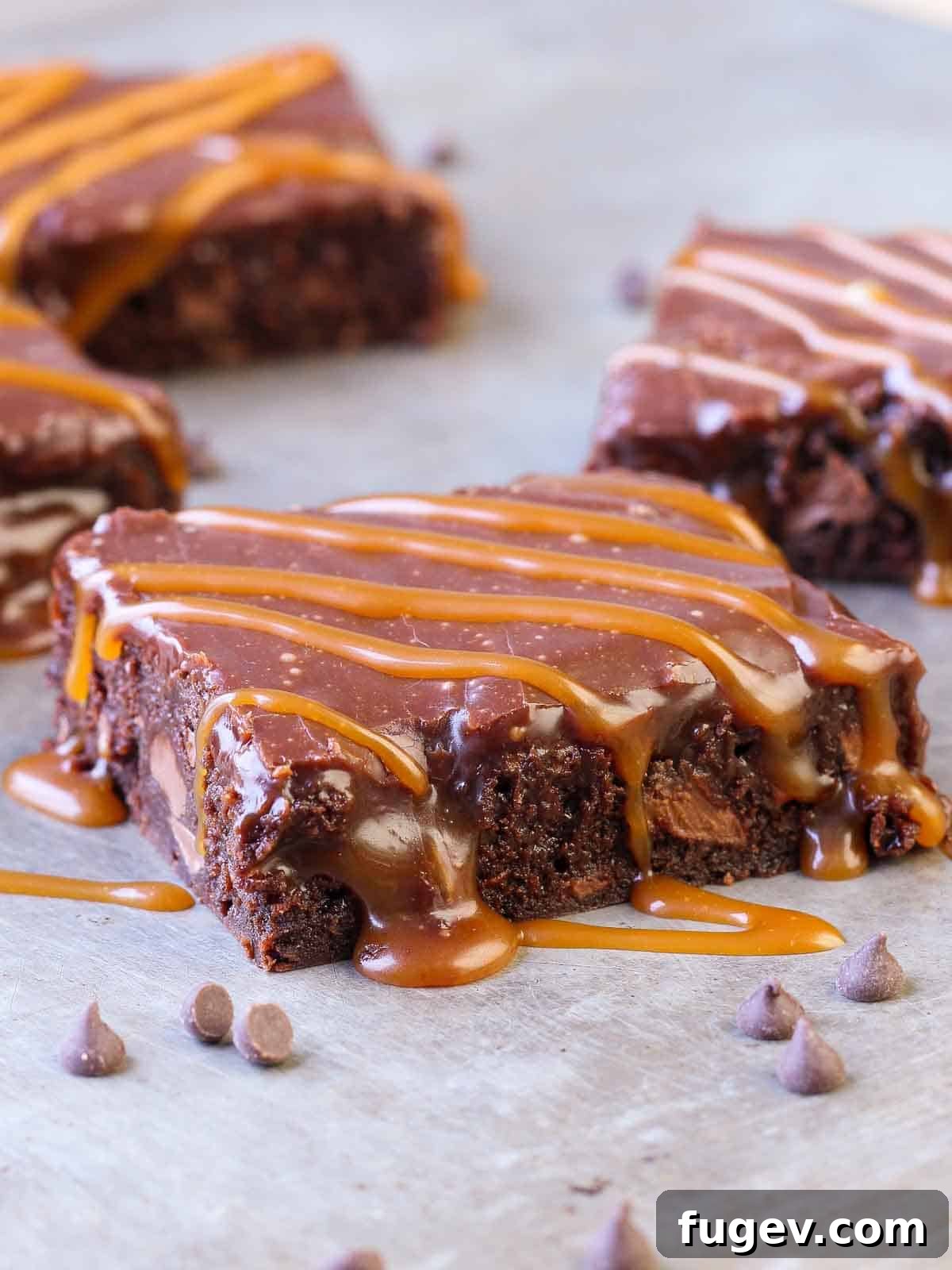 Decadent Caramel Brownie 2 Intensely fudgy caramel brownies with swirls of salted caramel and a luxurious Baileys Irish coffee ganache, perfect for a gourmet dessert