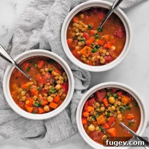 Hearty slow cooker Moroccan chickpea stew with sweet potatoes and carrots.
