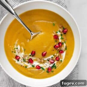 Bright yellow golden beet soup in a bowl.