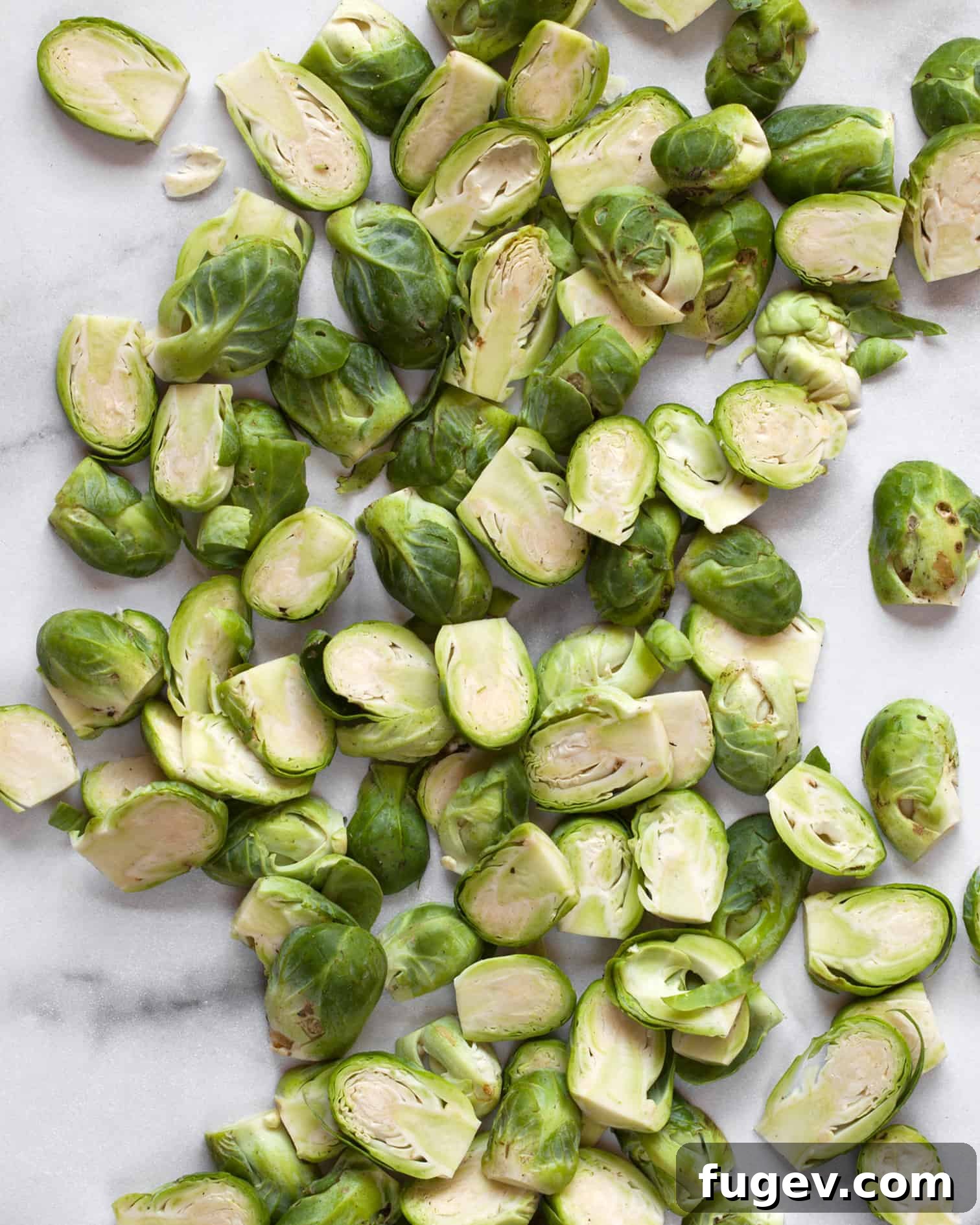 Sticky Sweet Heat Brussels Sprouts 5 Chopped Brussels sprouts in a bowl, ready to be mixed with the marinade