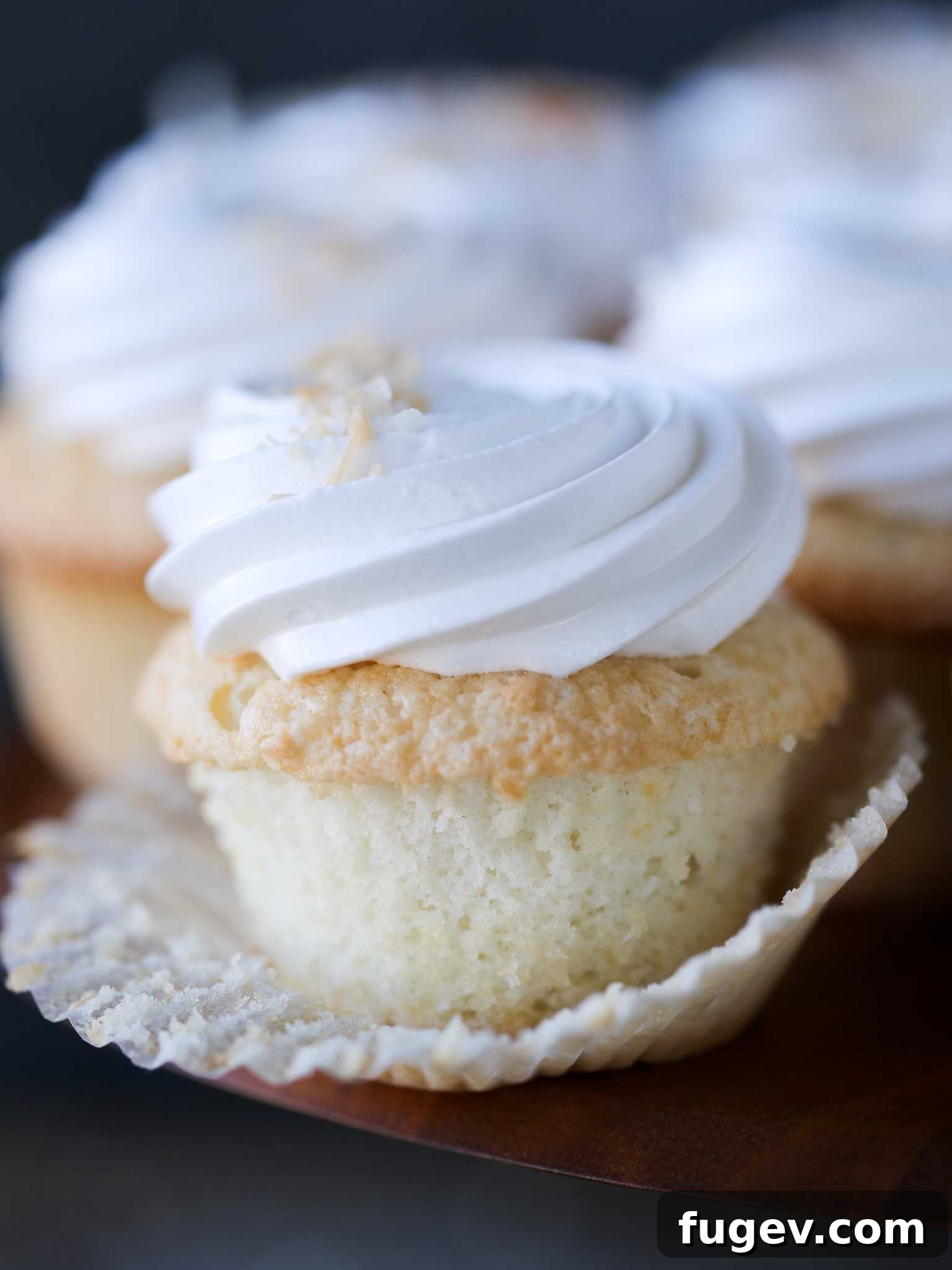Tropical Coconut Delights 2 Peeled Coconut Cupcake with Fluffy White Frosting