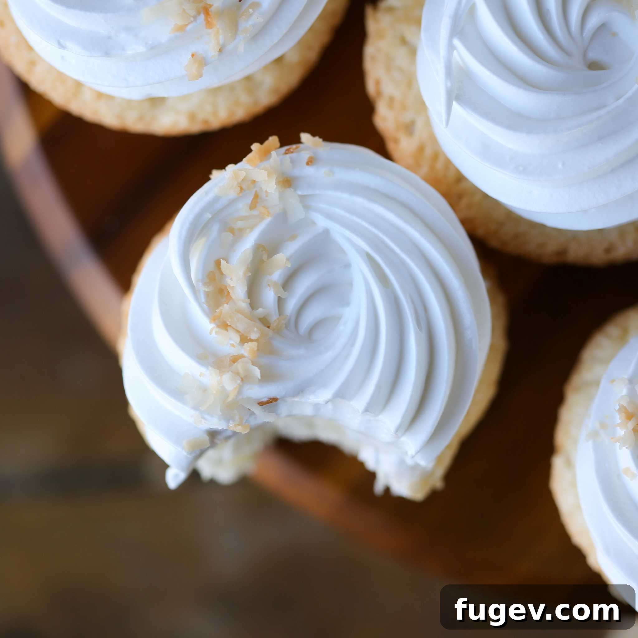 Tropical Coconut Delights 5 Bitten Frosted Coconut Dessert