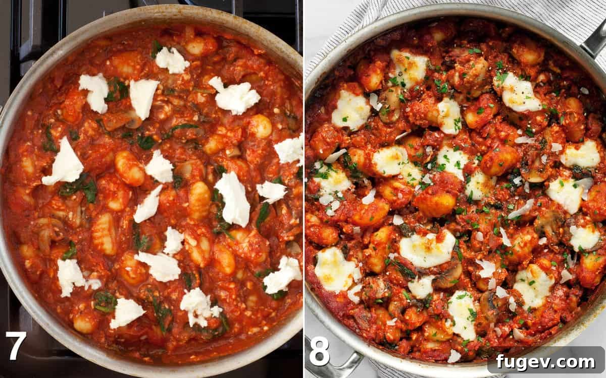 Hearty Mushroom & Spinach Gnocchi Bake 7 Baked gnocchi topped with torn mozzarella, ready to be sprinkled with Parmesan and parsley