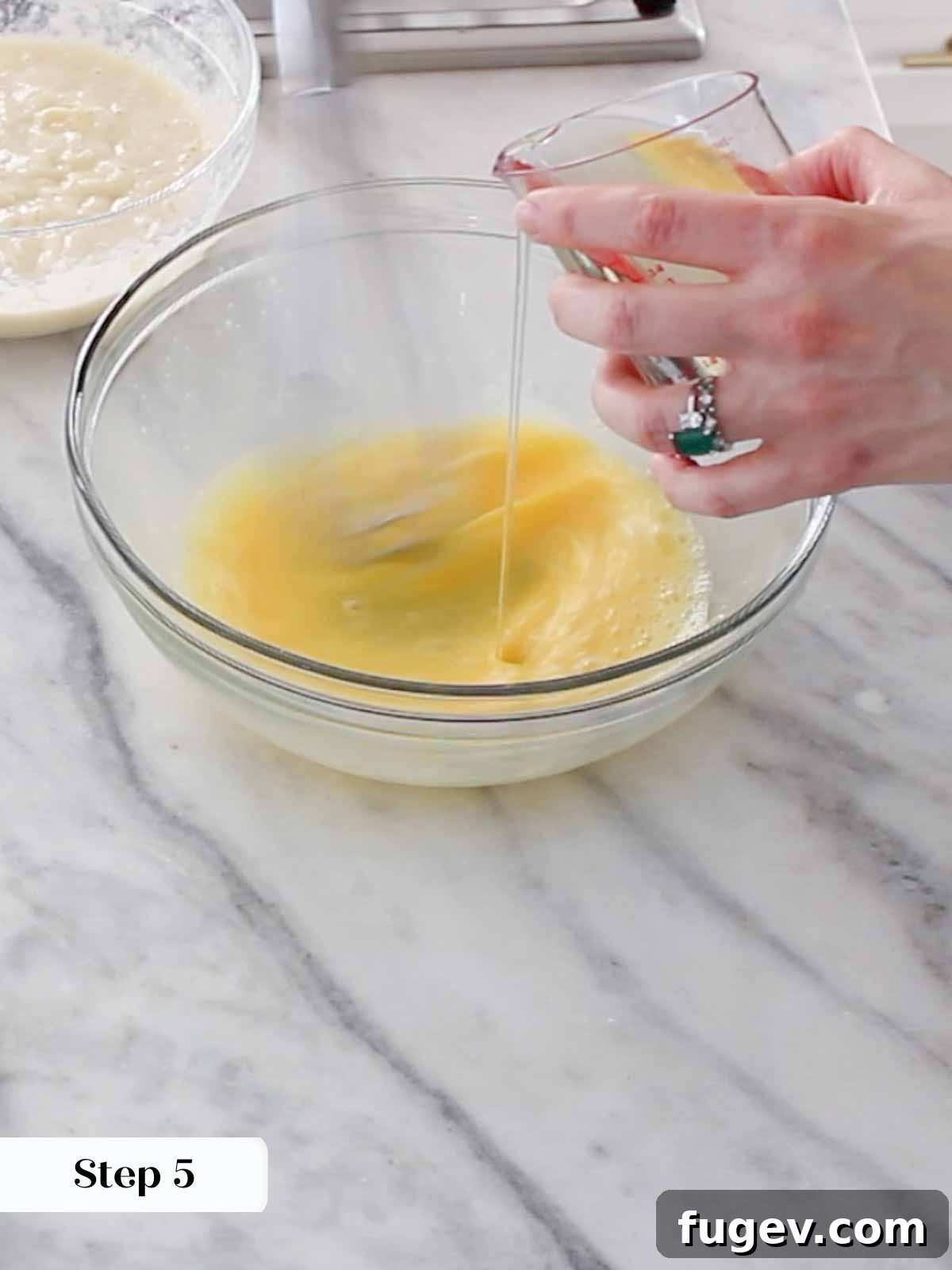 Sweet Nectar Delight 9 emulsifying oil into whipping eggs.