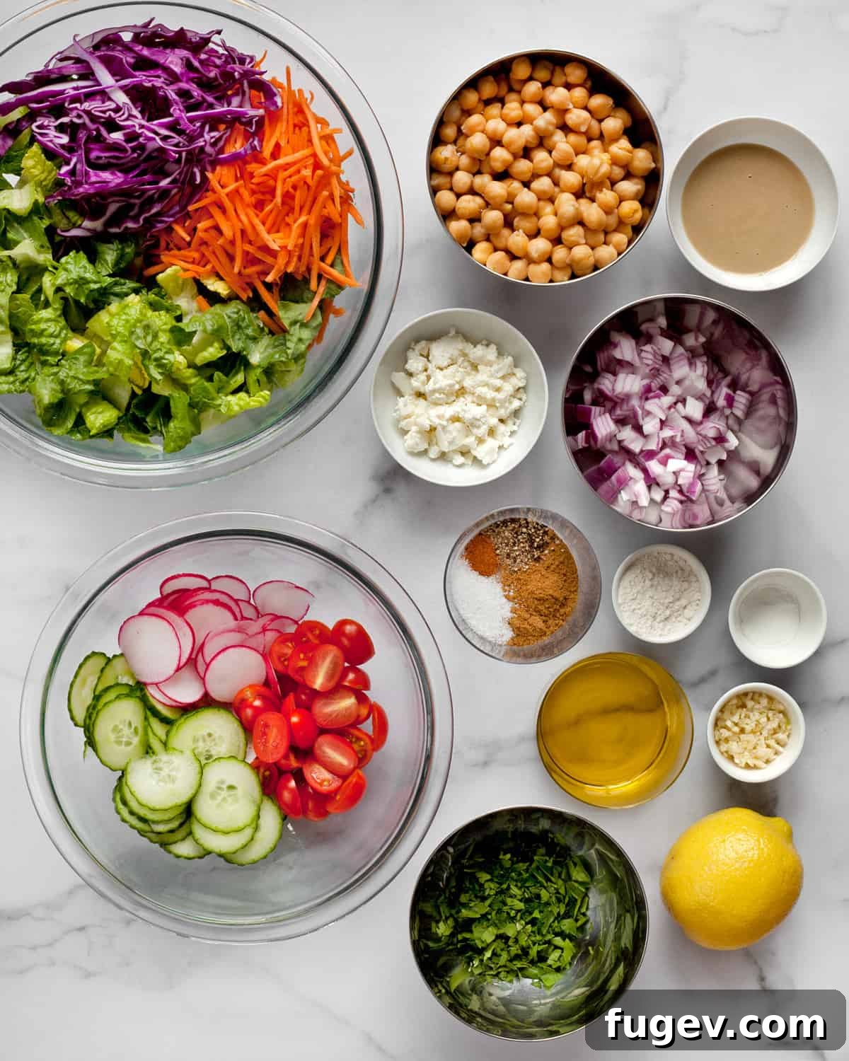 Mediterranean Baked Falafel Bowl 3 Ingredients for baked falafel salad including chickpeas, romaine, carrots, cabbage, cucumbers, tomatoes, radishes, and various spices.