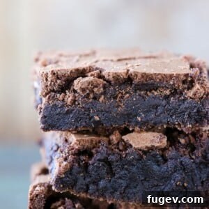 Brown butter brownie, showcasing its rich texture and perfect stackability.