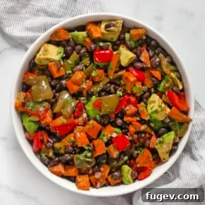 Roasted sweet potato salad in a bowl.