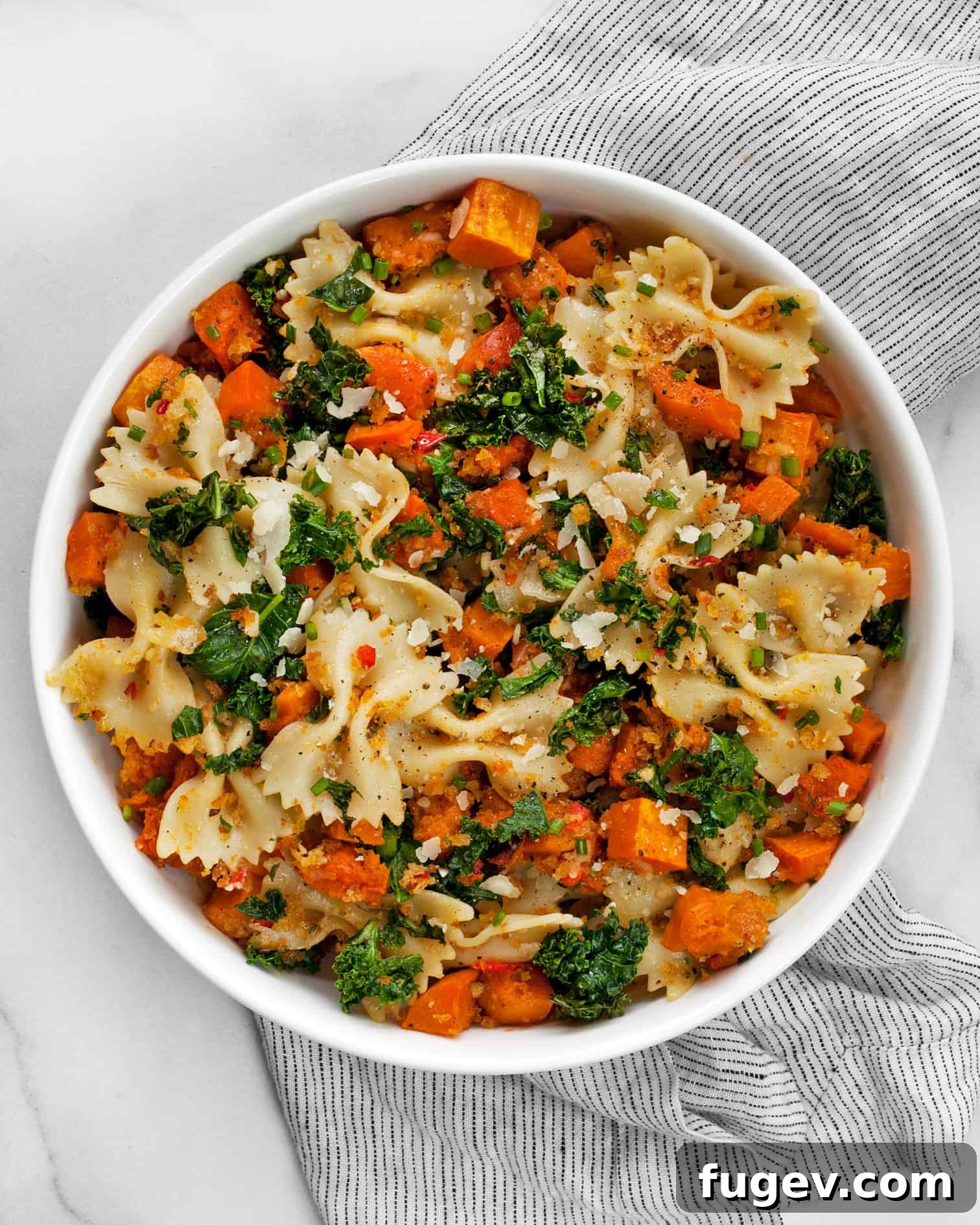 Golden Roasted Butternut Pasta 5 Delicious Butternut Squash and Kale Pasta in a serving bowl