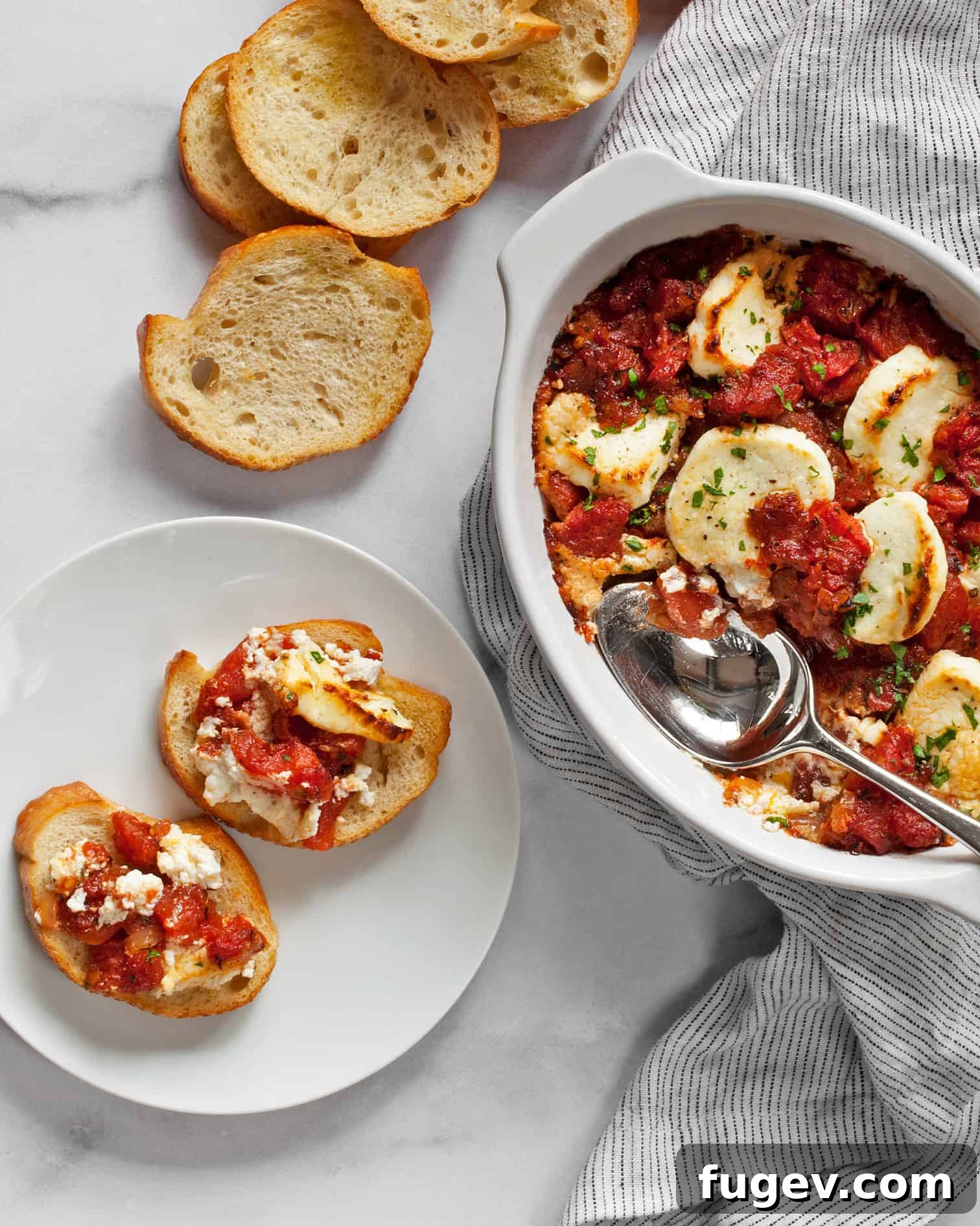 Creamy Baked Goat Cheese Dip 2 Baked goat cheese appetizer with tomatoes and herbs