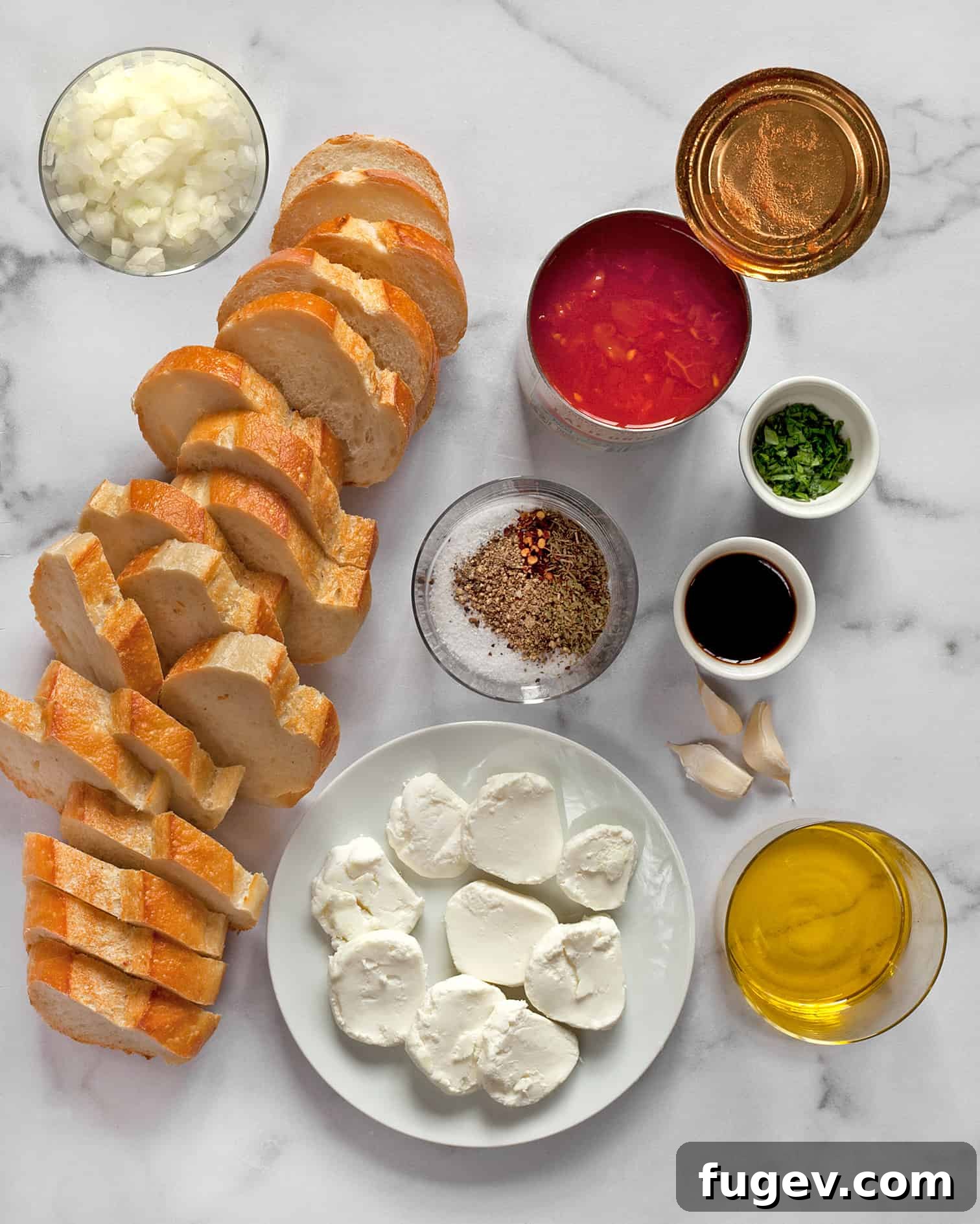 Creamy Baked Goat Cheese Dip 3 Ingredients for goat cheese tomato appetizer laid out on a table