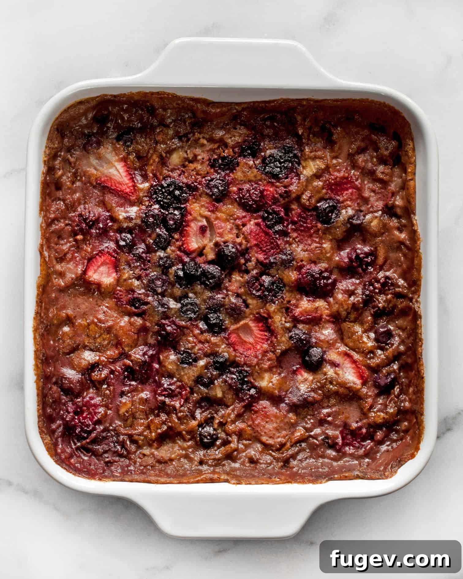 Baked Berry Steel-Cut Oats 10 Baked oatmeal in the dish, golden and puffed