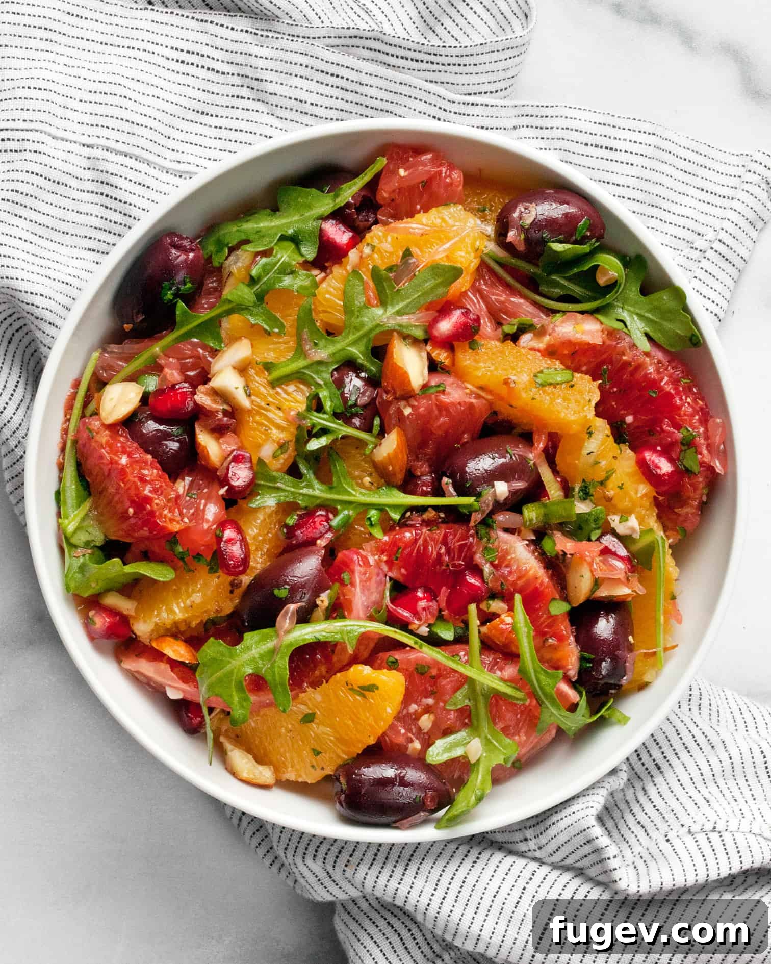 Vibrant Citrus Salad with Briny Olives and Pomegranate Jewels 2 Vibrant Winter Citrus Salad with Pomegranate Seeds, Olives, and Arugula