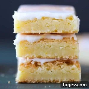 Lemon Blondies Trio Featured, showing a close-up of the textured glaze and soft interior.