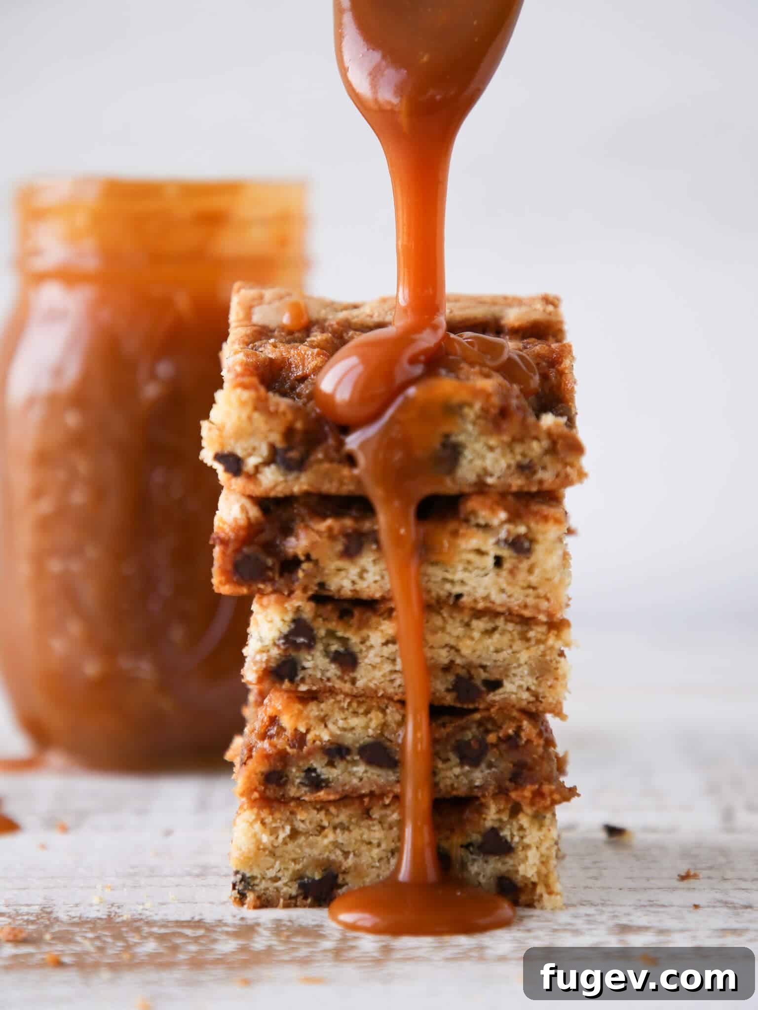 Chewy Caramel Chocolate Chip Blondies 2 Caramel Chocolate Chip Blondies caramel pour on stack